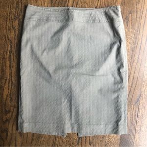 The limited gray pencil skirt